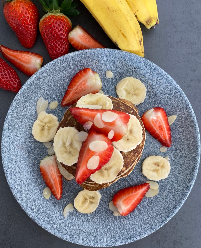 Banana Pancakes decorated with strawberries and banana