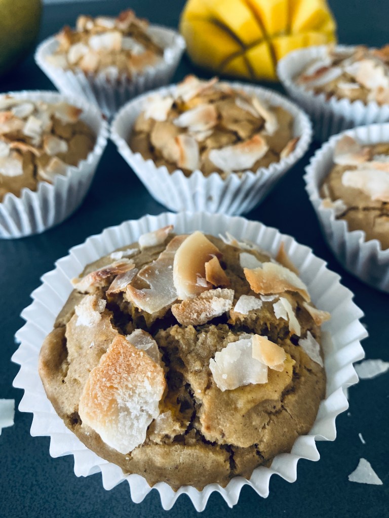Vegan mango muffins with coconut flakes 