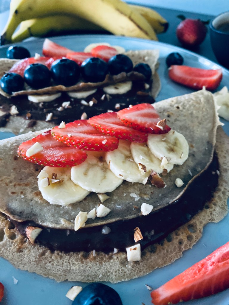 Buckwheat Pancakes with Chocolate Sauce with Fruits and Berries